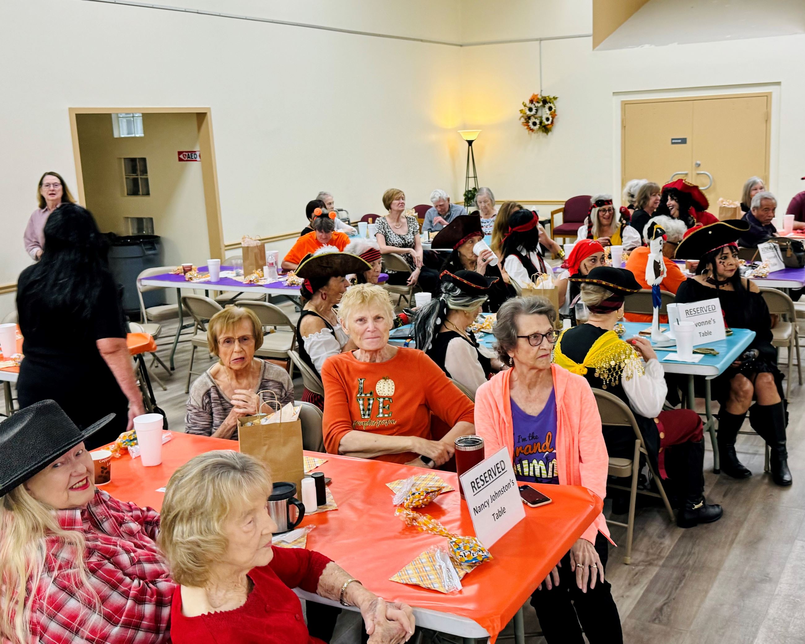 picture of participants sitting waiting on lunch