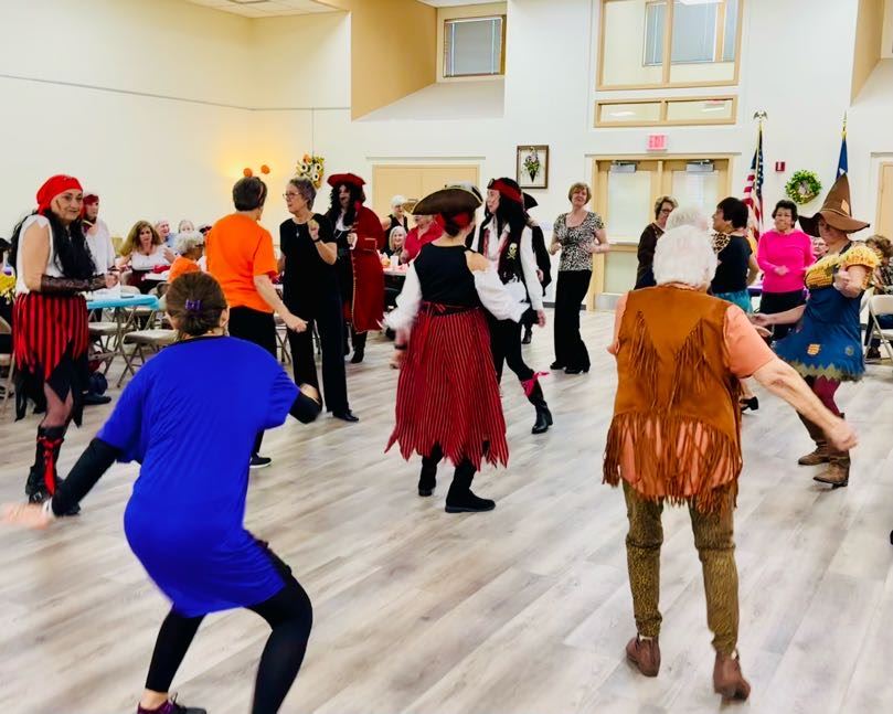 picture of participants doing line dancing