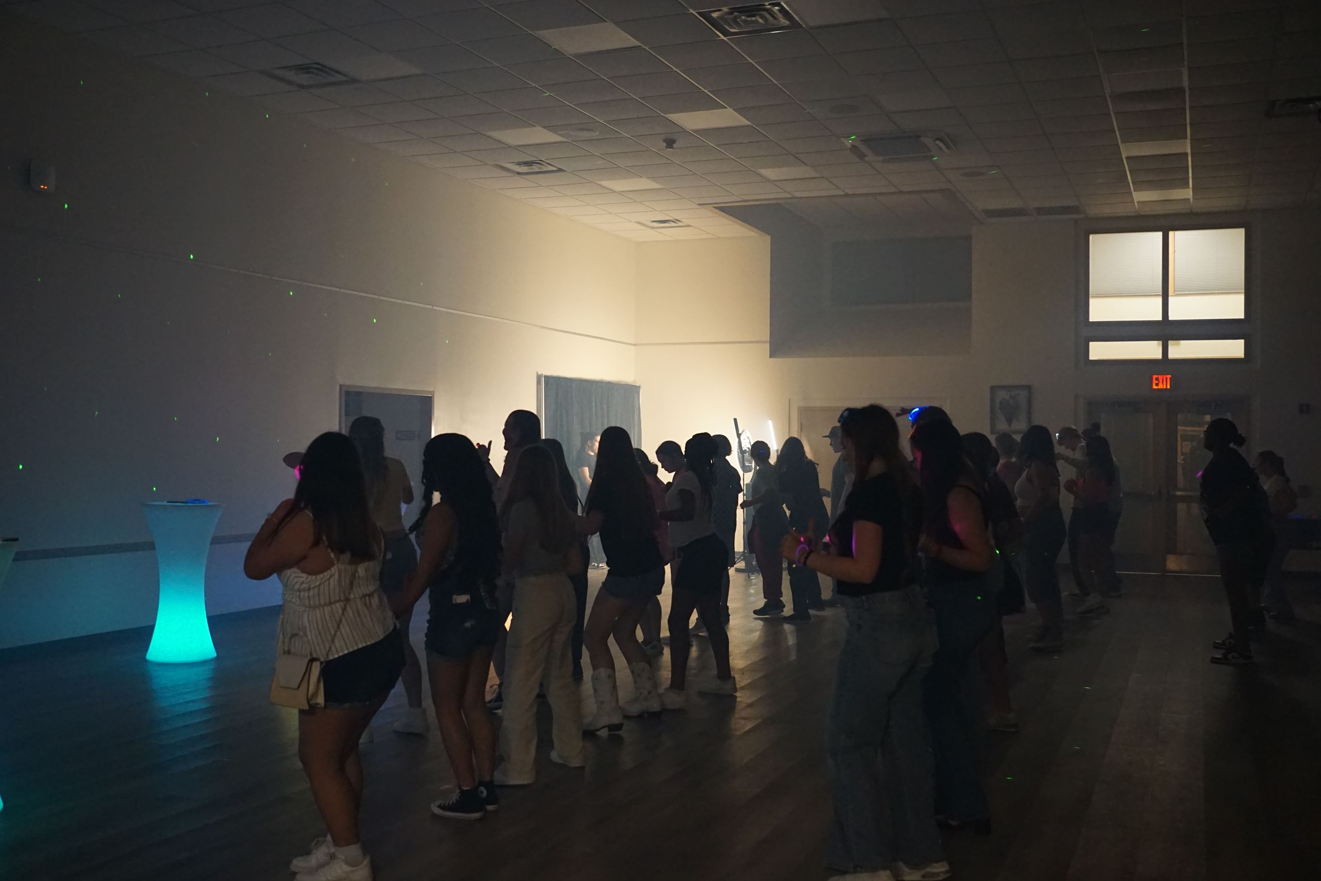 group picture of teens line dancing