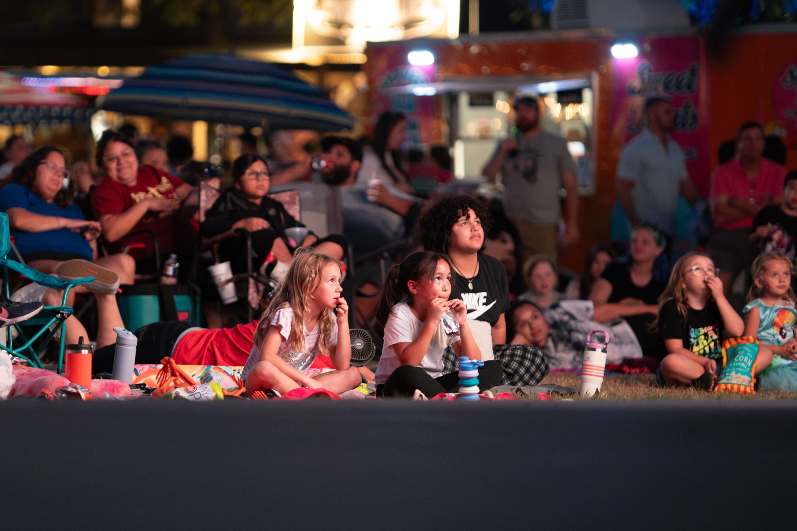 Image of Moviegoers Watching Harry Potter in the Tomball Depot Plaza