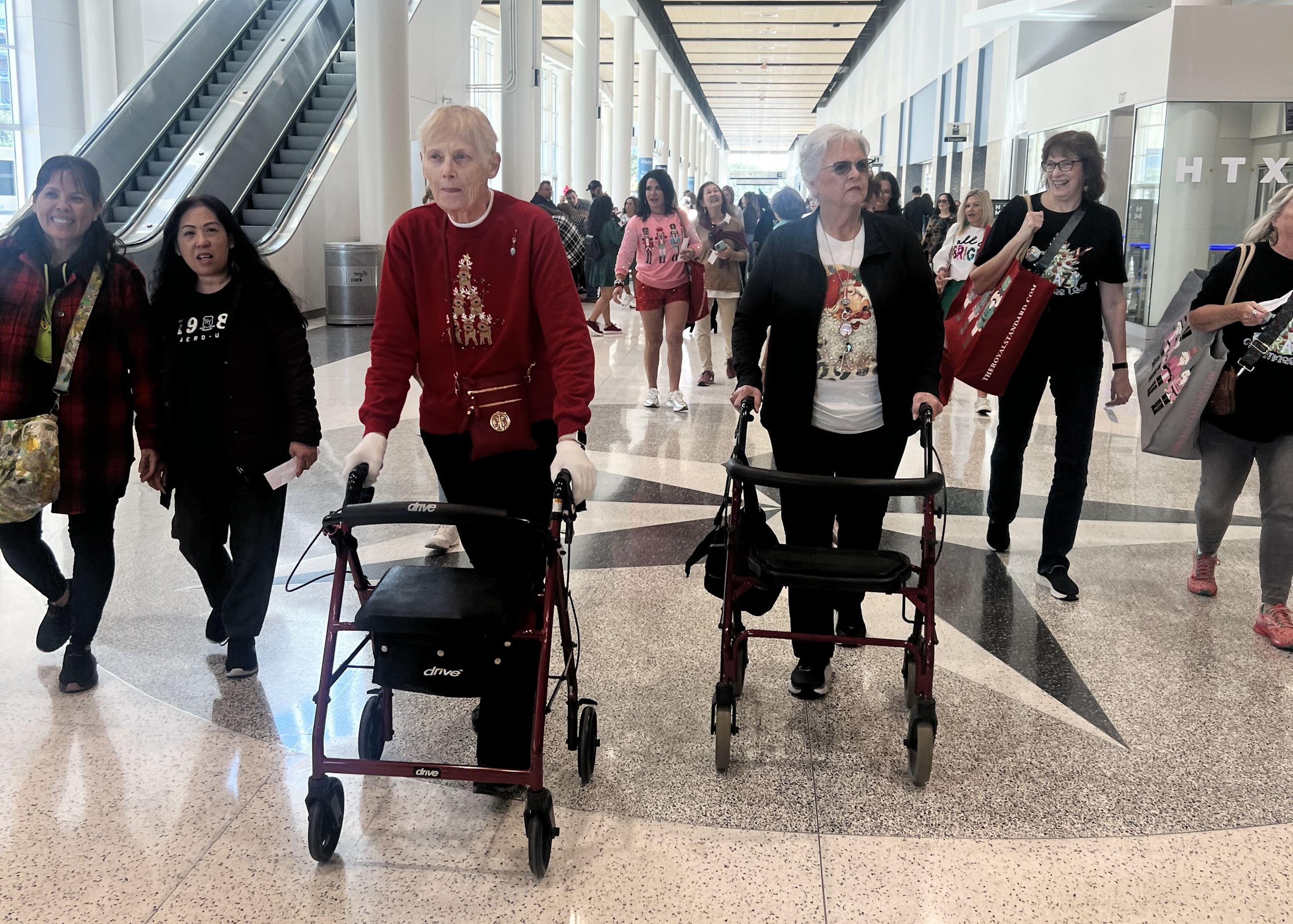 Image of Tomball Community Center group walking through NRG from Nov. 2024 bus trip