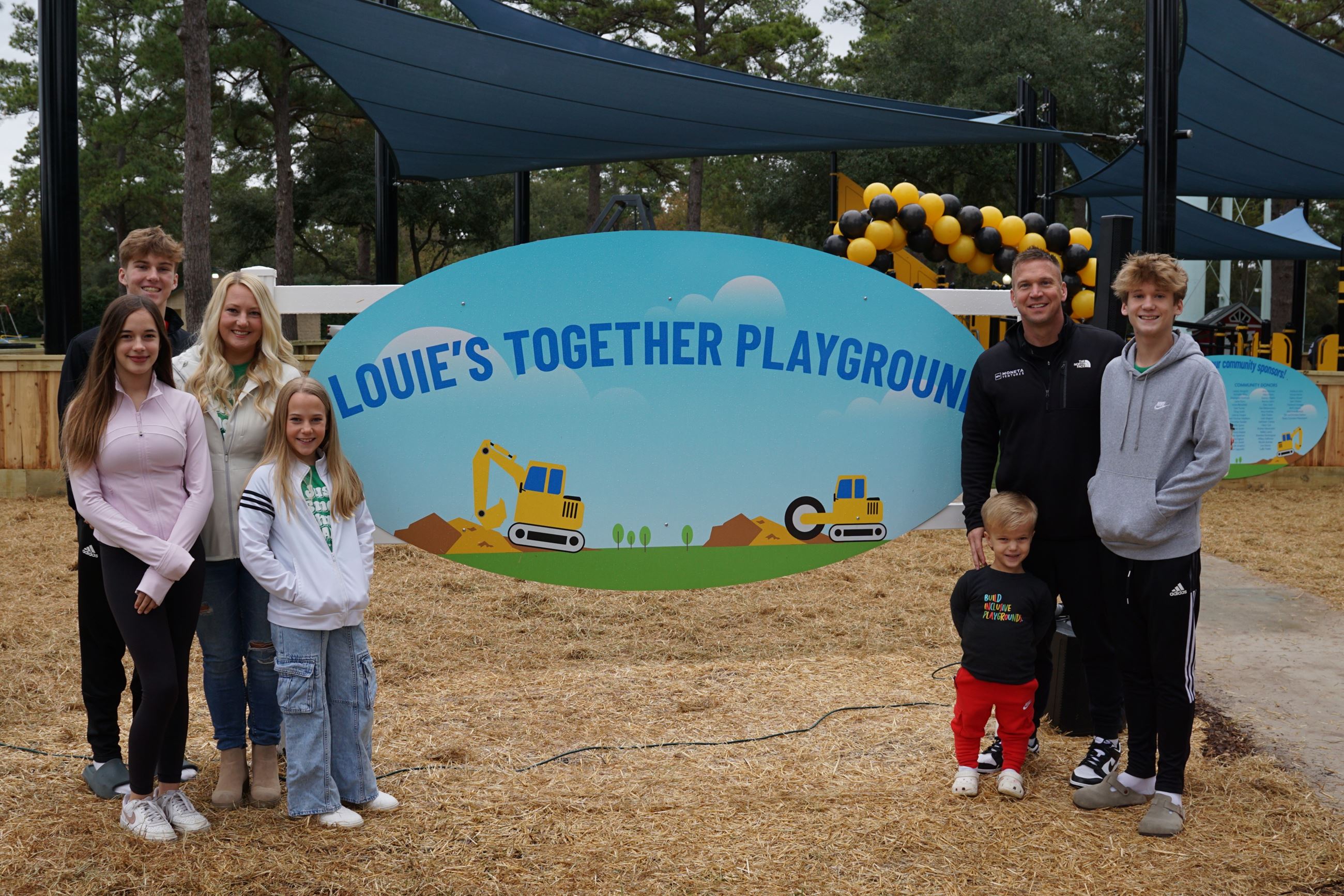 Image of Munson Family at Louie's Together Playground