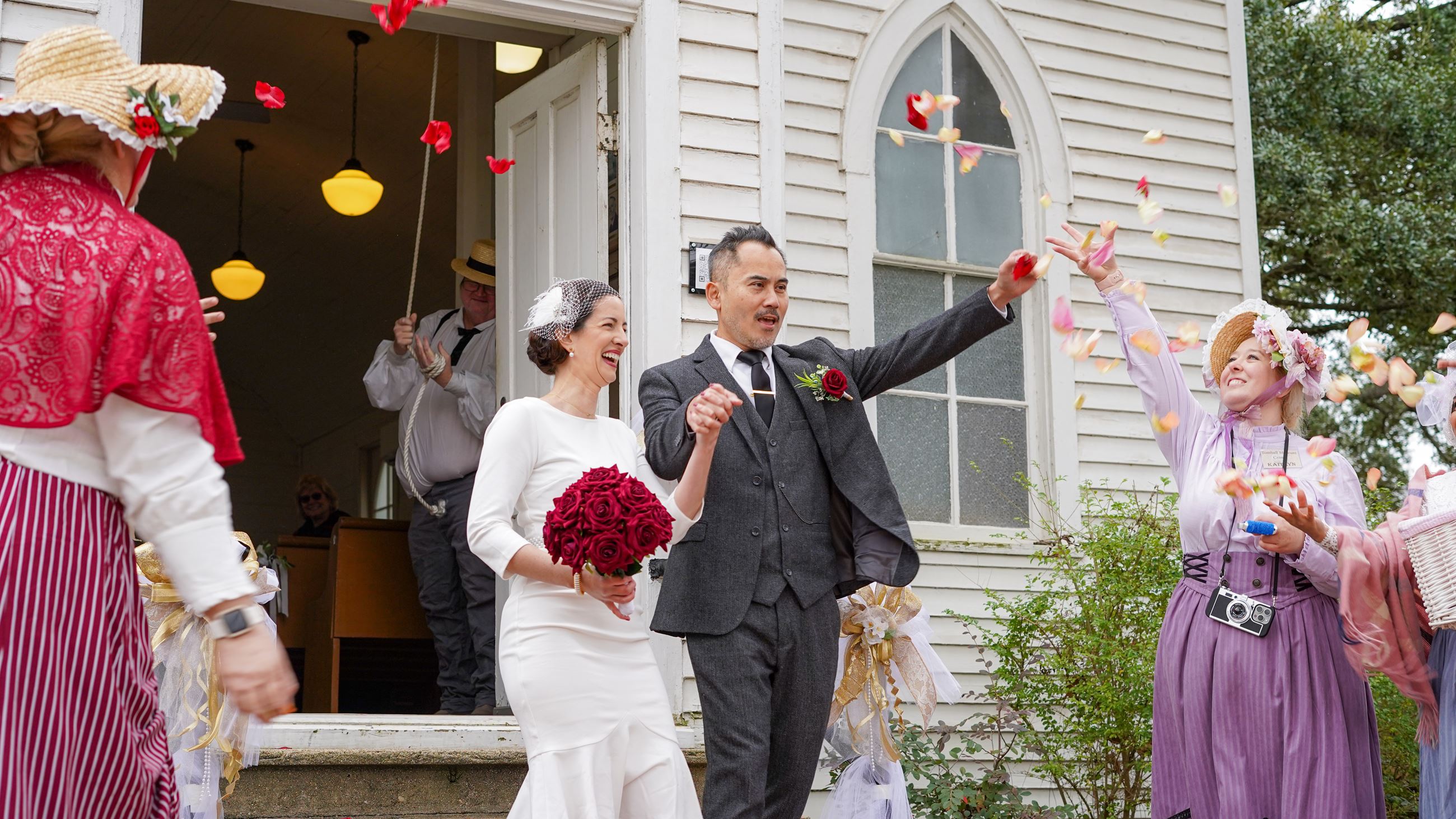 Image of Newlyweds exiting Tomball Museum Center Chapel at Swift Sweetheart Weddings 2025