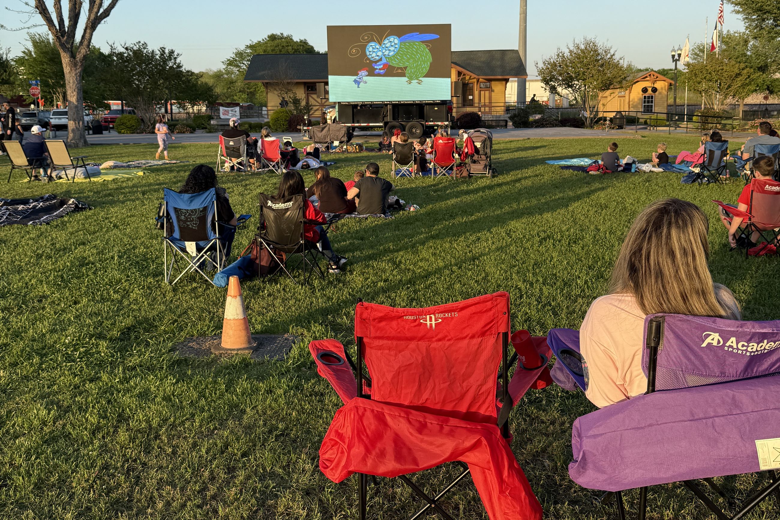 Image of moviegoers at April 2025 2nd Saturday at the Depot watching Honey, I Shrunk The Kids