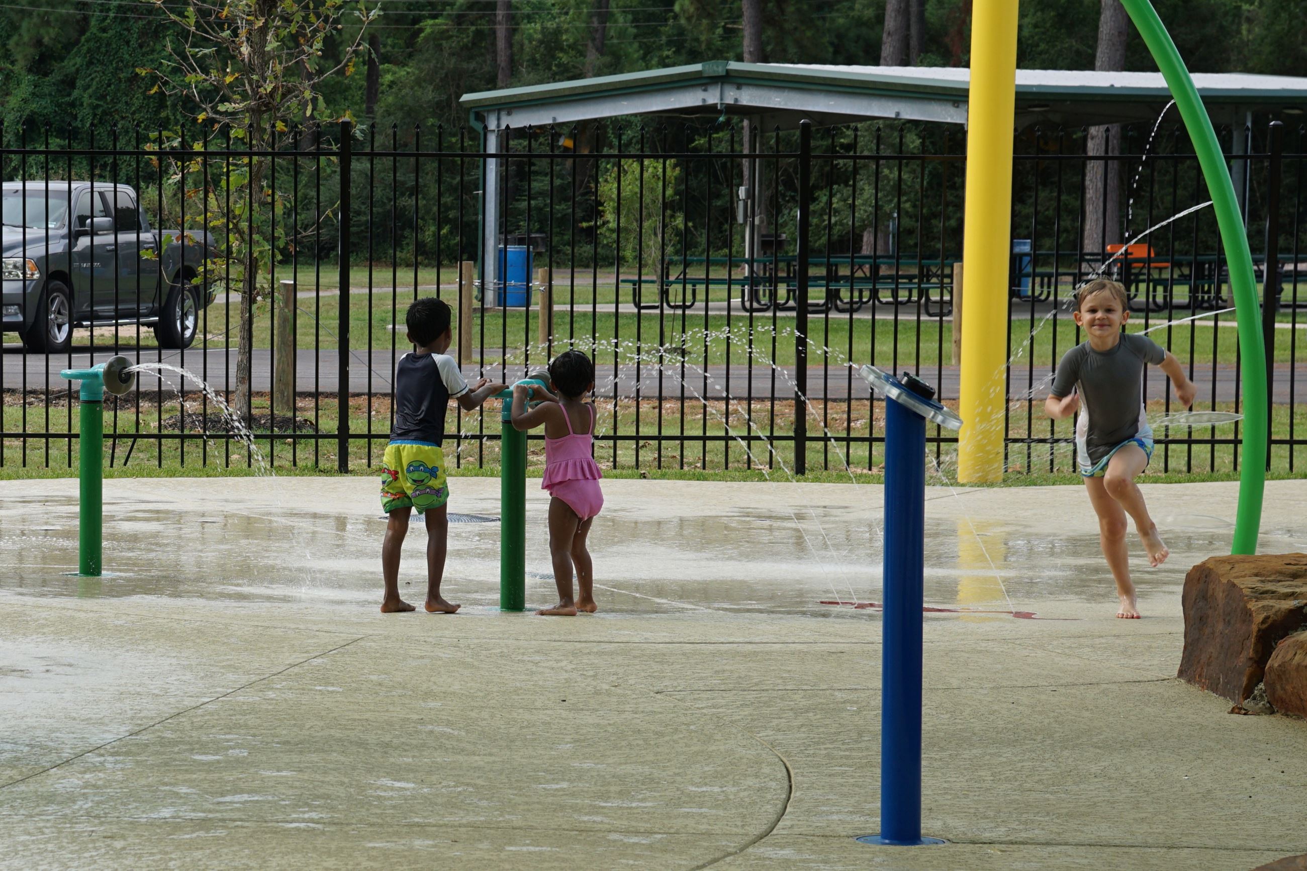 Image of children playing at Jerry Matheson Splash Pad during August 2025 Kids Club