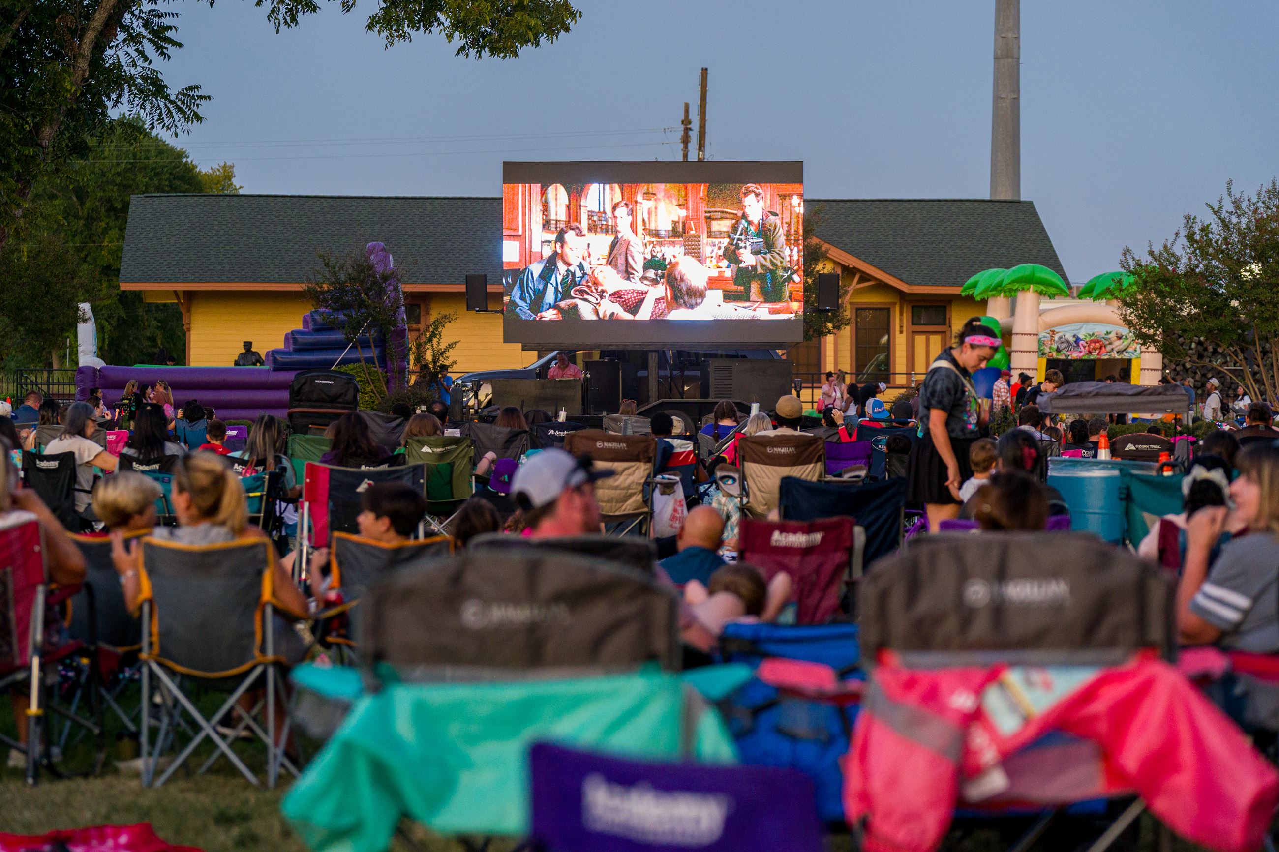 Image of attendees watching Ghostbusters at Spooktacular 2nd Saturday 2025