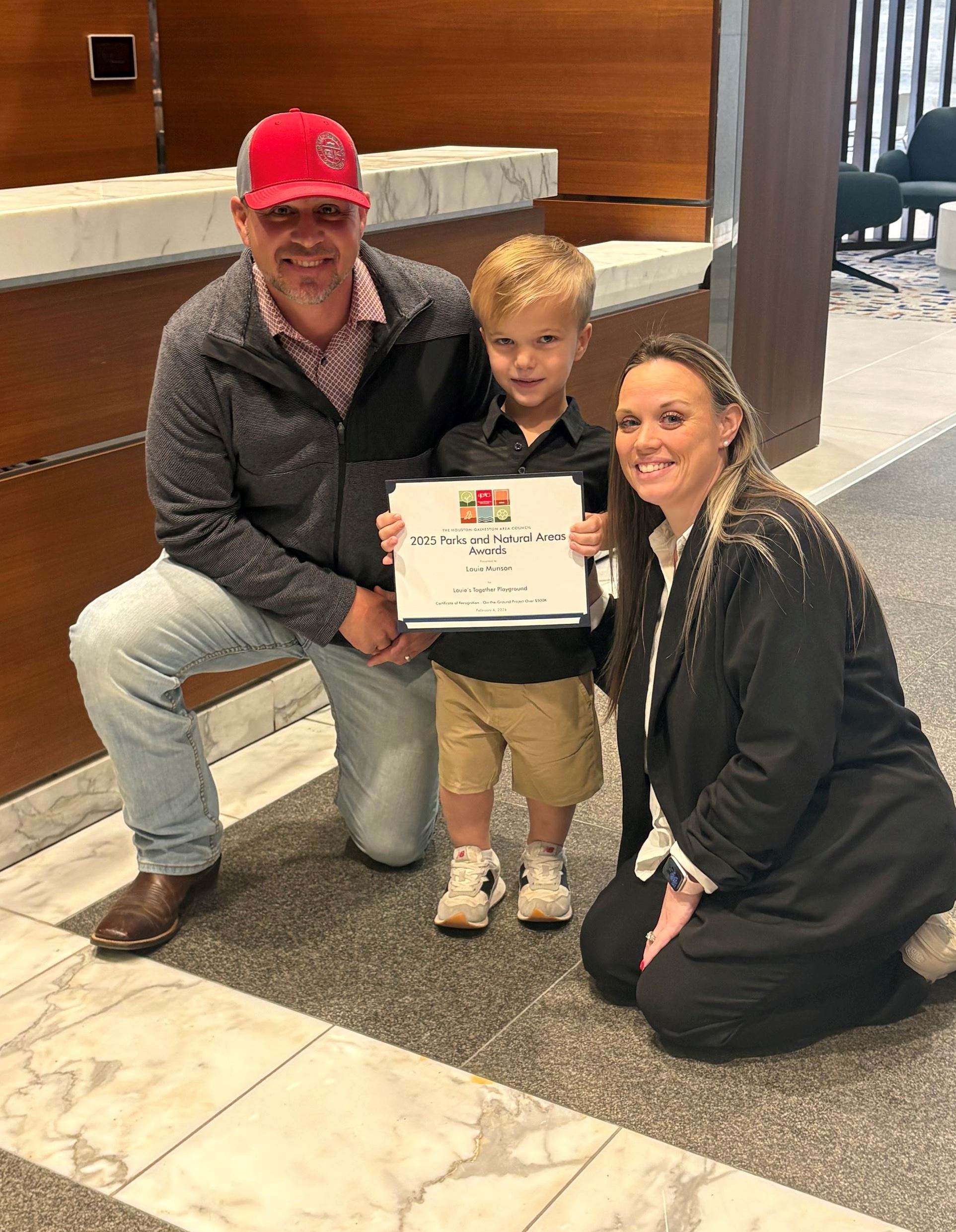 Image of Louie Munson and City Staff at Louie's Together Playground HGAC Award Presentation